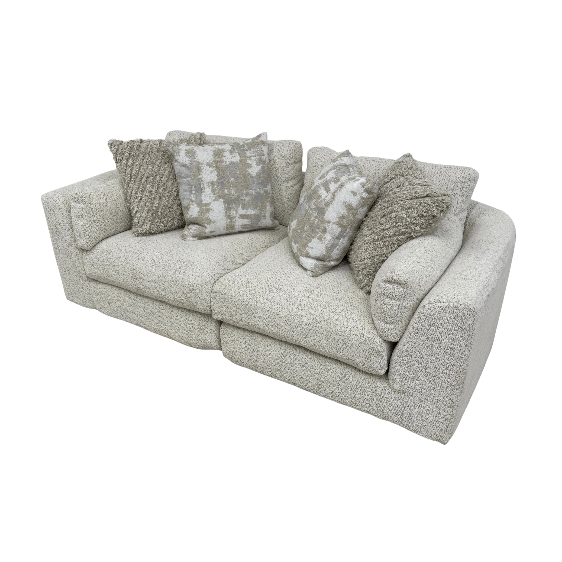 Gray sofa with patterned cushions on a white background