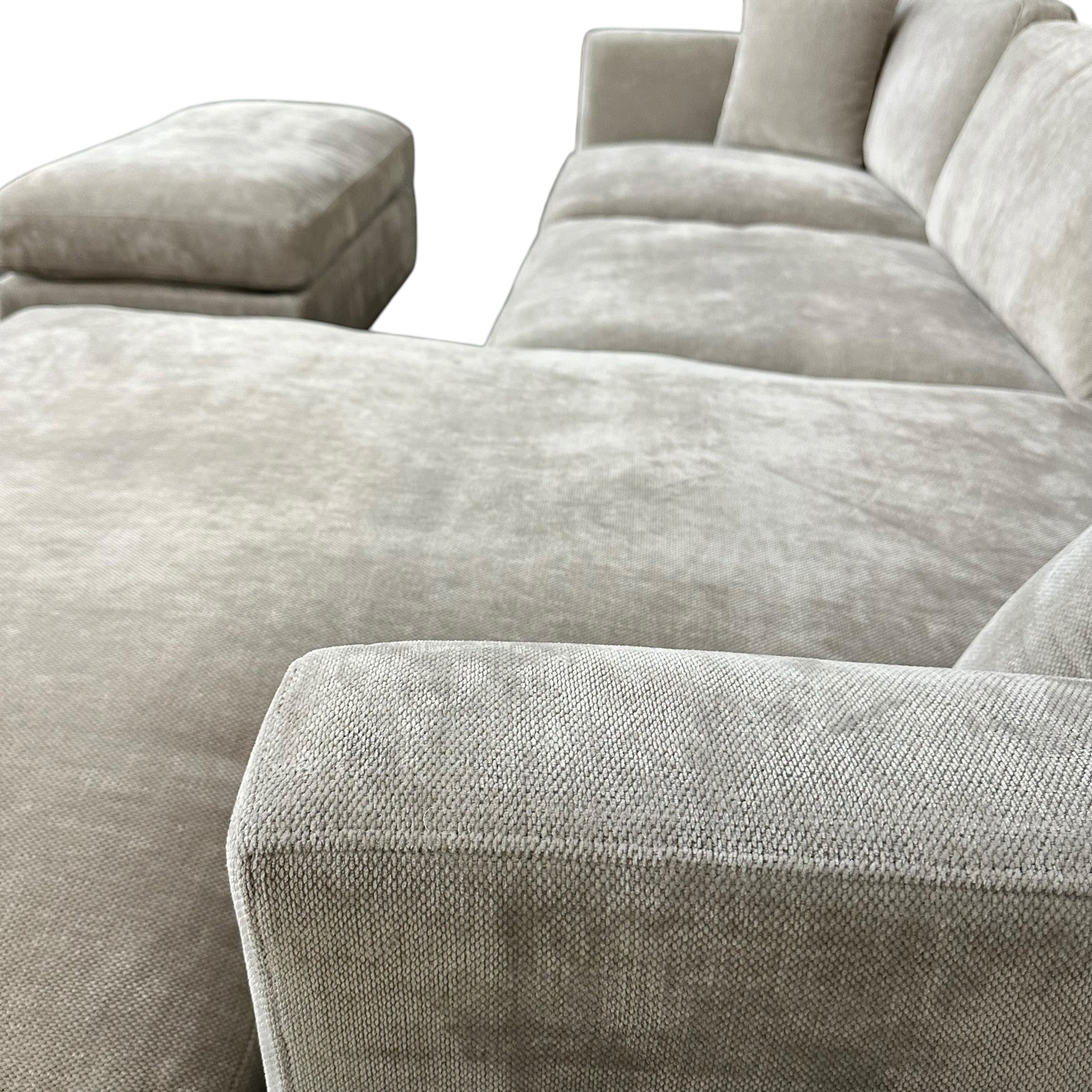 Sectional with Reversible Chaise and Ottoman in Gray