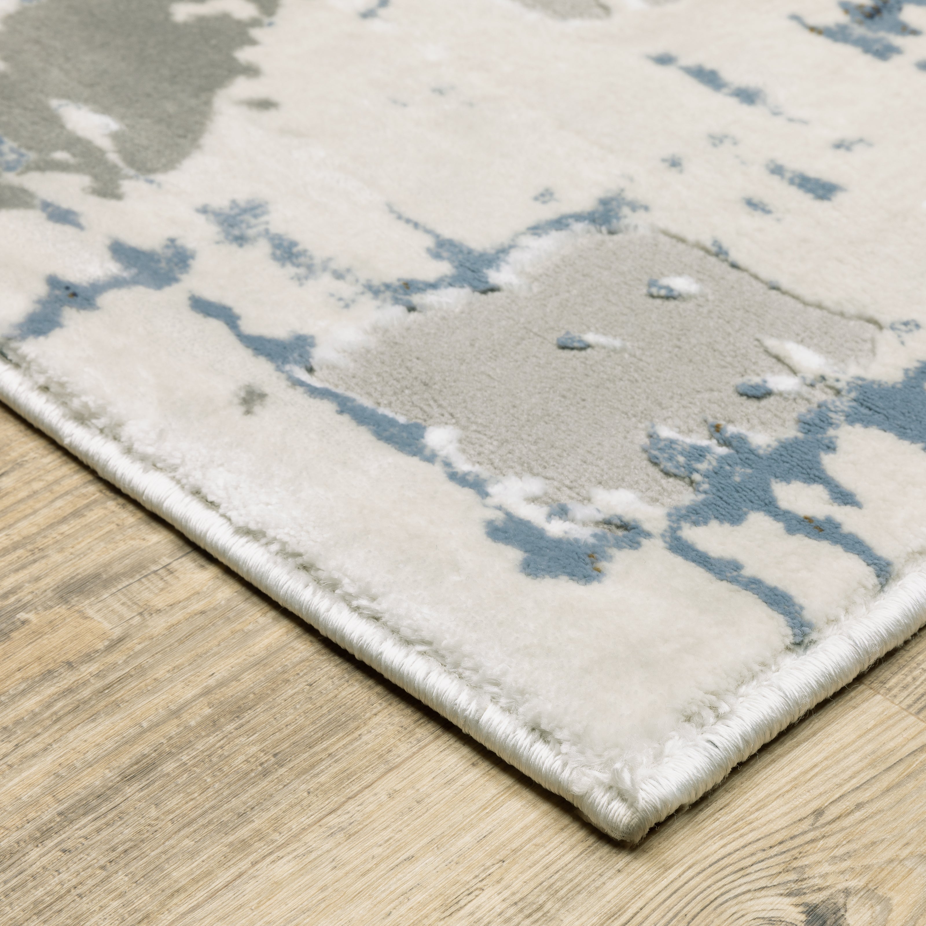 Oriental Weavers Easton 8111X Ivory/Blue Area Rug