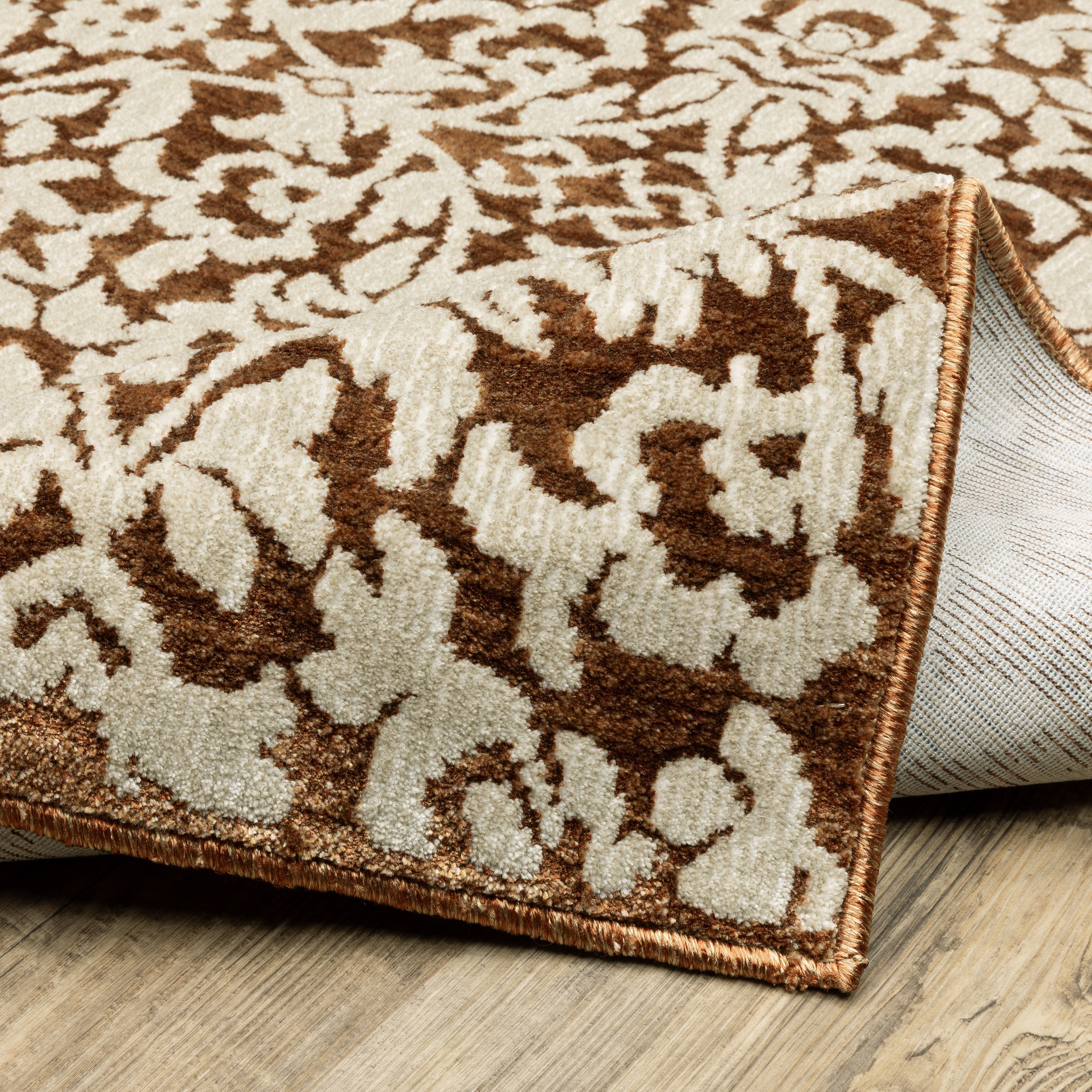 Oriental Weavers Intrigue INT02 Rust/Ivory Area Rug