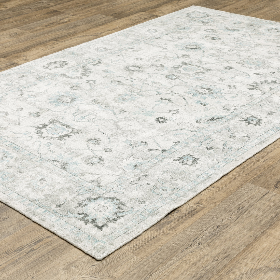 Oriental Weavers Windham WIN04 Ivory/Blue Area Rug